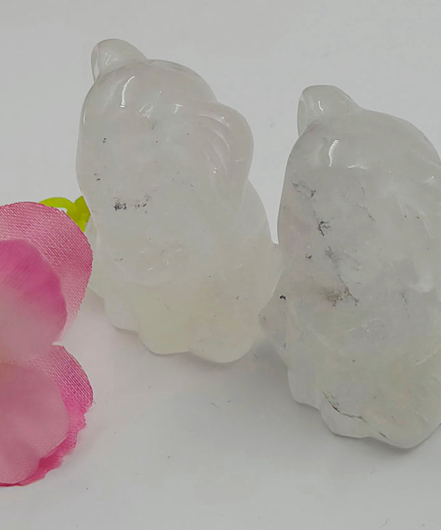 Sitting clear quartz elephant carvings
