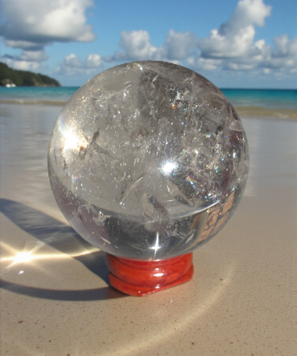 High grade clear quartz sphere with amazing rainbows