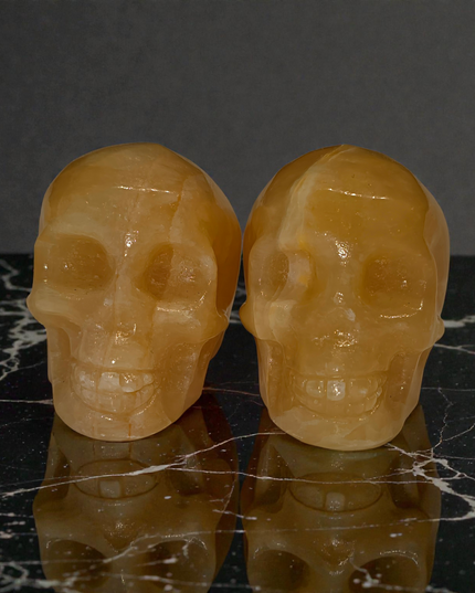 Yellow calcite skull carving