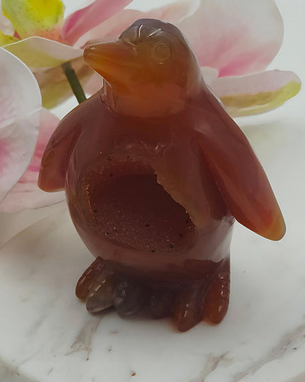 Carnelian penguin carving