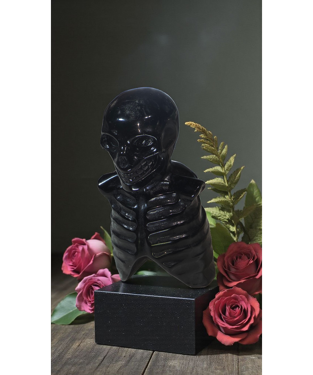 Obsidian skeleton carving