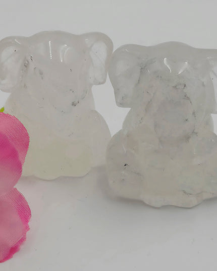 Sitting clear quartz elephant carvings