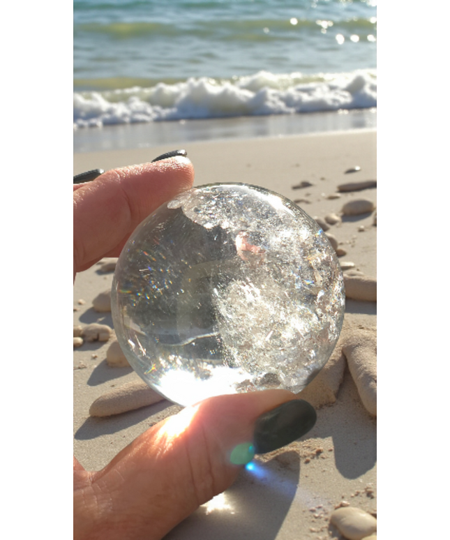 High grade clear quartz sphere with amazing rainbows