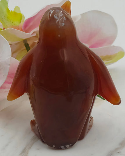 Carnelian penguin carving